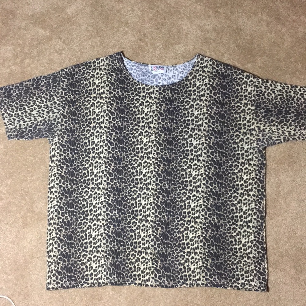 Animal print short sleeved top. Size 3X